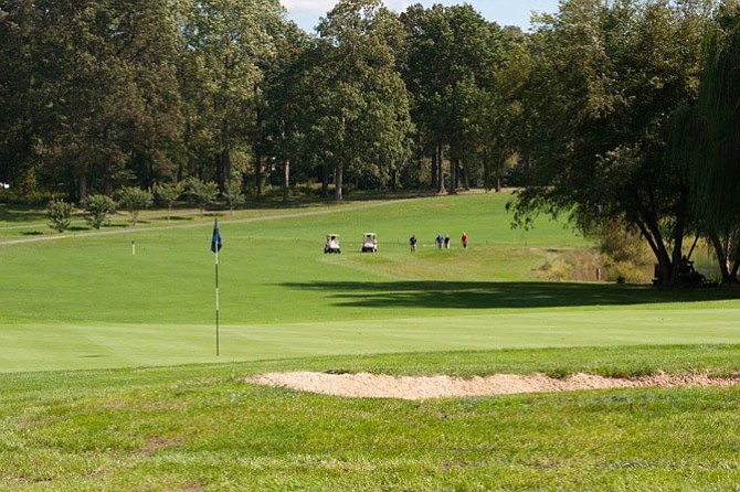 Golfers play at Reston National Golf Course during Rescue Reston’s Golf Tournament and Nature Walk in October 2016.