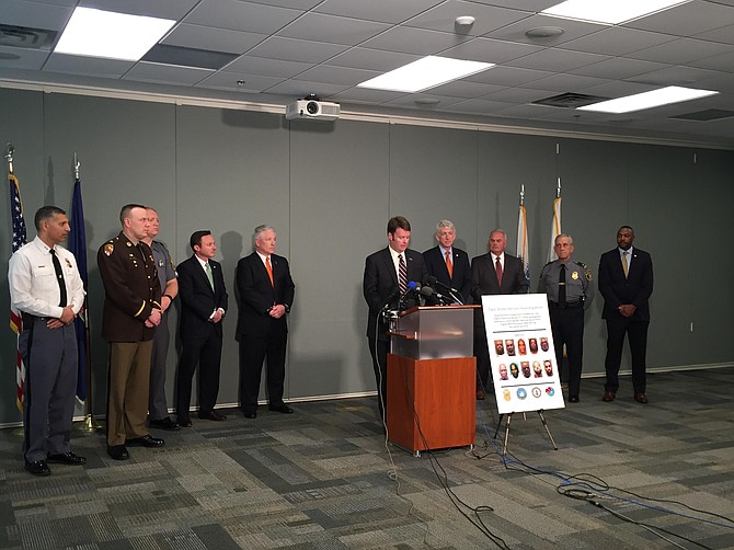 Commonwealth Attorney Bryan Porter announces 11 arrests connected to major heroin trafficking ring.