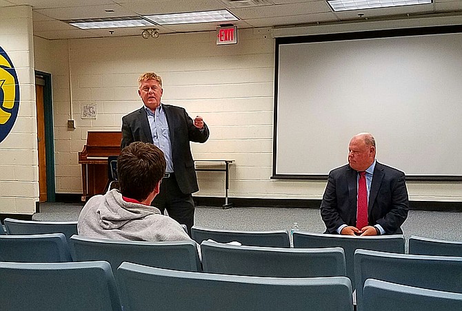 (Left) Supervisor John Cook (R-Braddock) and at-large school board member Jeanette Hough hosted a budget community meeting, featuring (right) County Executive Ed Long, at Robinson Secondary School on March 28.