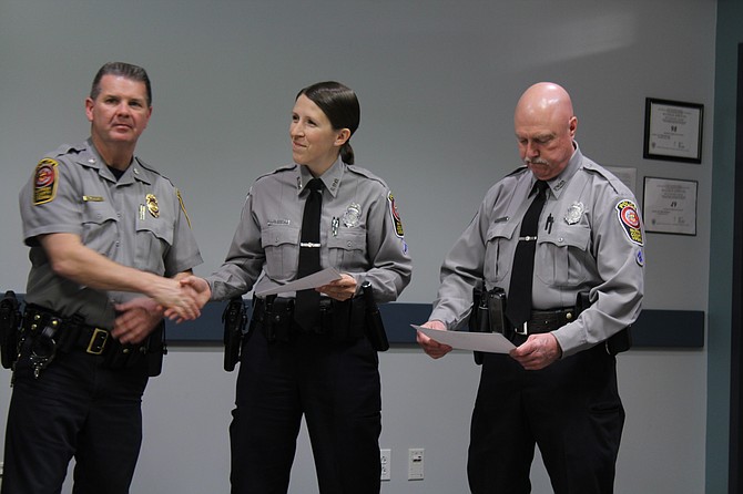Fairfax County Police Department officers were awarded for their utilization of Nextdoor while on the job (from left): Deputy Chief of Police for Administration Lt. Col. Tom Ryan, Officer Tara Gerhard of the Sully District Police Station and Officer Wayne Twombly of the Fair Oaks District Police Station.
