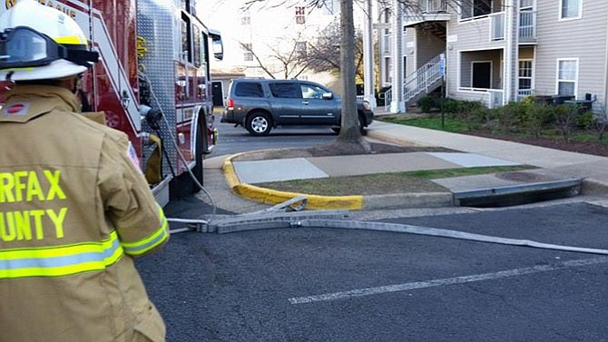 Firefighters from Station 38 undergo training at a local apartment complex.