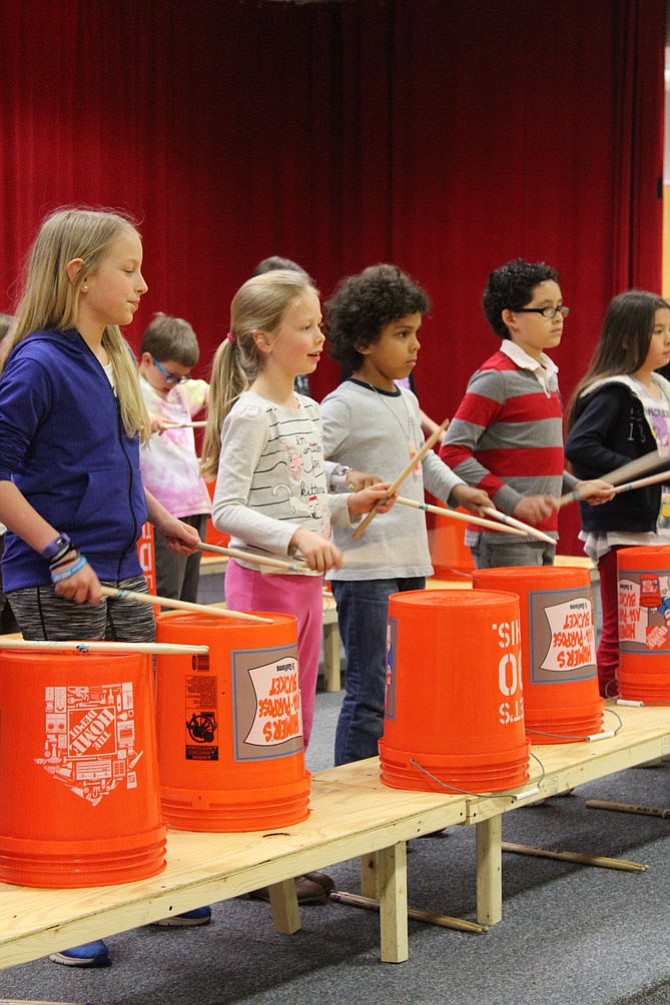 The evening performance showcased the bucket drumming skills of children from Clearview Elementary School (pictured above) as well as children from Herndon Elementary School. The after school programs not only taught drumming, but life skills such as respect for others and cooperation.