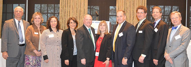 The April 6 Economic Outlook summit hosted by the Mount Vernon-Lee Chamber of Commerce and Southeast Fairfax Development Corporation also featured (from left) Dr. Gerald L. Gordon, Fairfax County EDA; Jane Gandee, Chamber Chairman; Rebecca Cooper, Washington Business Journal; Ann B. Macharas, Federal Reserve Bank of Richmond; Dr. Terry Clower, GMU Center for Regional Analysis; Edythe Kelleher, SFDC executive director; Mark Viani, SFDC Vice President; Scott Stroh III, Chamber President; Robert Stalzer, Fairfax County Deputy Executive; and Dr. Frank Nothaft, CoreLogic.
