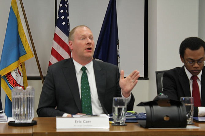 Newly elected Reston Association At-Large Director Eric Carr speaks during a candidates’ forum at RA headquarters during the election where he was facing five other opponents.
