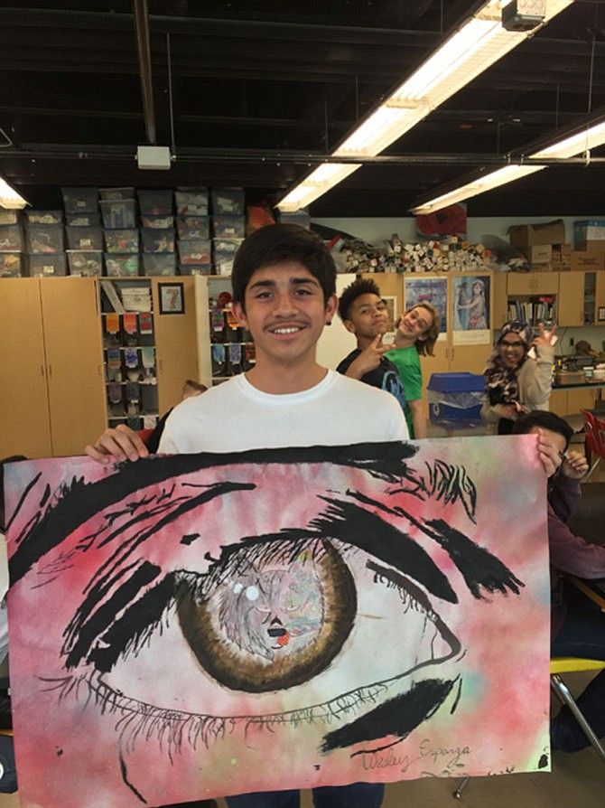 Wesley Esparza with his Andy Warhol-inspired painting.