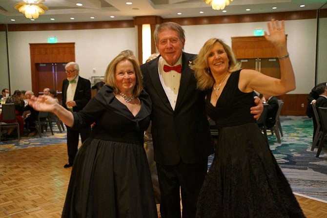 Cindy and Greg Golubin take to the dance floor with Elizabeth Wilmot at the Symphony Orchestra League of Alexandria’s 30th annual ball and auction March 18 at the Westin Alexandria Hotel.
