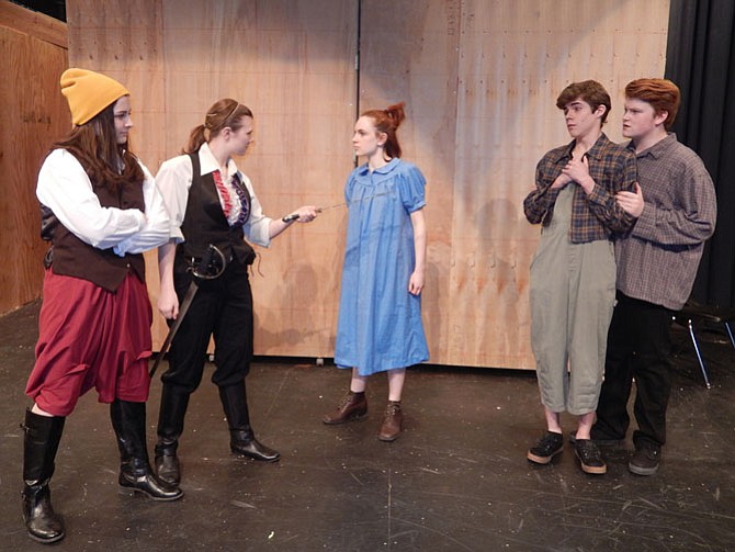 From left: Meryn Holtslander, Caroline Grass, Caroline Orejuela, Andrew Black and Jacob Lamb rehearse a scene where a pirate captain searches for a treasure trunk of “starstuff.”