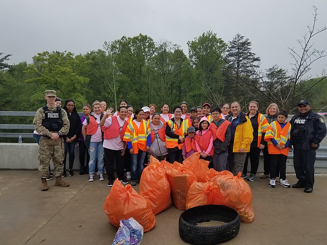 Volunteers from the Mount Vernon-Lee Chamber of Commerce and Fort Belvoir Garrison Command partnered to clean up trash from around the Jeff Todd Way and Mount Vernon Memorial Highway intersection on April 22.