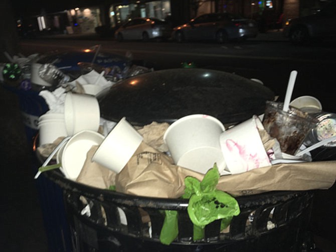 A recent Sunday night in Del Ray shows take-out containers piled up in the neighborhood’s full trash cans.
