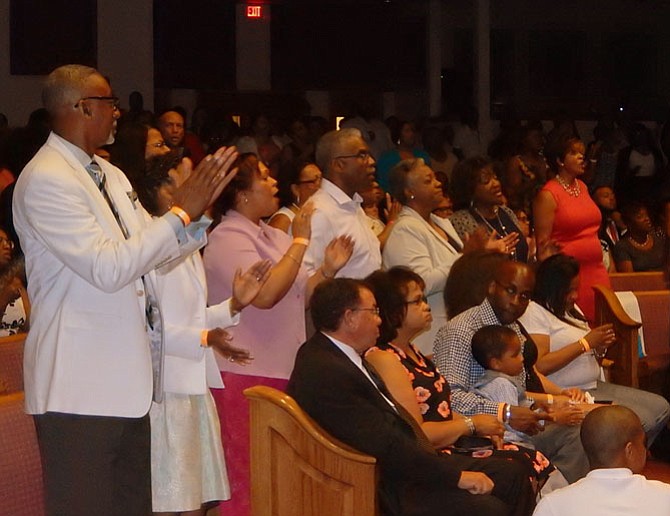 The crowd gets into the spirit of the music.