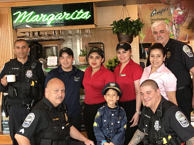 From left: SPO Aftab, Sergeant Saa, Freddy Ramos, Marie Elena Bairez, Omar Ghannam, Wendy Chavez, Officer Miranda, Amanda Alfaro and Lieutenant Berg gather together at Guapo’s Restaurant during “Coffee with a Cop” held Sunday, May 7, 2017. Guapo’s provided the coffee and hosted the event. “We appreciate their support,” said Jane Ross, Herndon Police Department Information Specialist. 