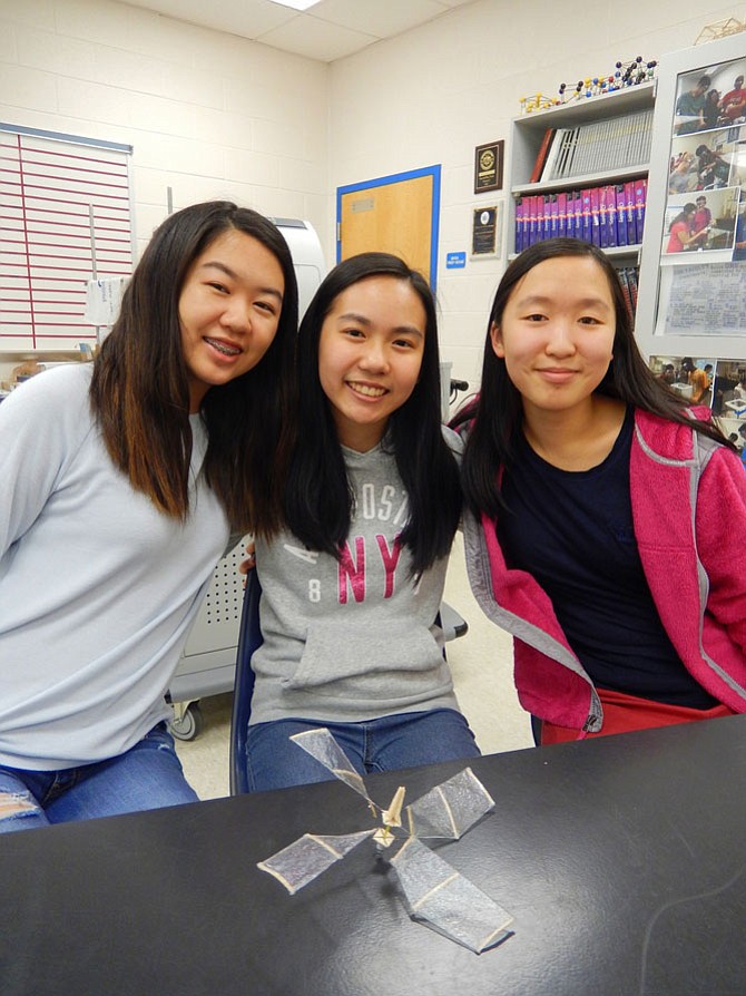From left: Grace Ko, Janessa Jiang and Emily Sheng with the helicopter they designed and built.