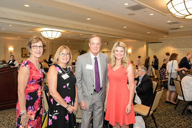 Assistance League of Northern Virginia's president and fundraiser chair pose with event sponsor ShounBach and featured guest speaker at the nonprofit's annual Spring Fundraiser.  From left are Linda Shilts, Linda Stephens, Al Bonin, and Kimberly Suiters.