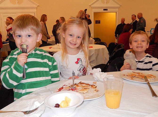 The Prentice siblings (from left) Luke, Emma and Connor, enjoy themselves at last year’s pancake breakfast.