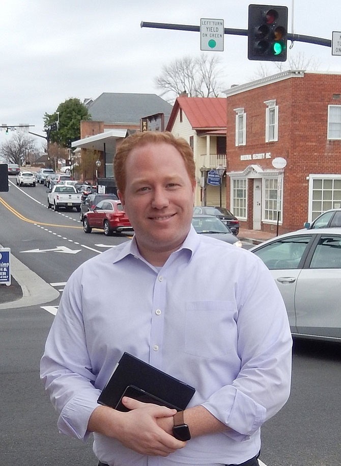 Chris Bruno in Old Town Fairfax, with Main Street behind him.