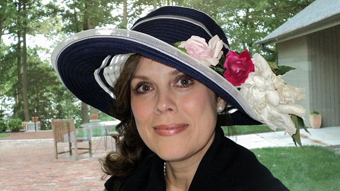 Jennifer Garner Fleming dons her Derby Day best using fresh flowers for a Simple Changes Kentucky Derby Party at George Mason University's School for Conflict Analysis and Resolution's Point of View in Mason Neck on May 6.