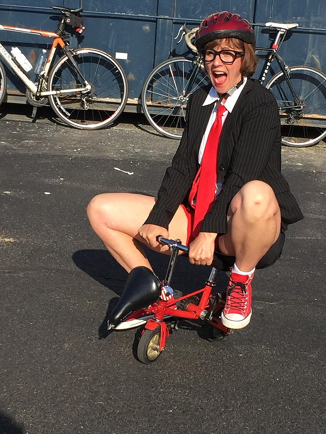 Lisa Polinori, the Unicycle Lady, has been at the Ballston pit stop for Bike to Work Day on May 19 since 6:30 a.m. According to Tim Kelley, the Operations Manager at Freshbikes on Wilson Blvd., they expect 600 people to be coming through their site between 6:30-9:00 am. with about 20% participating for the first time this year. There are 6 pit stop sites located across Arlington County. He says Freshbikes is the educational and outreach element for Arlington government promoting the advantages of bike riding in the county. 