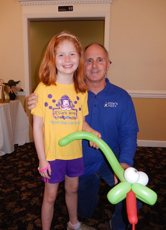 Ellie Whitfield and teacher Jay Coakley, who founded Ellie’s Hats for her.
