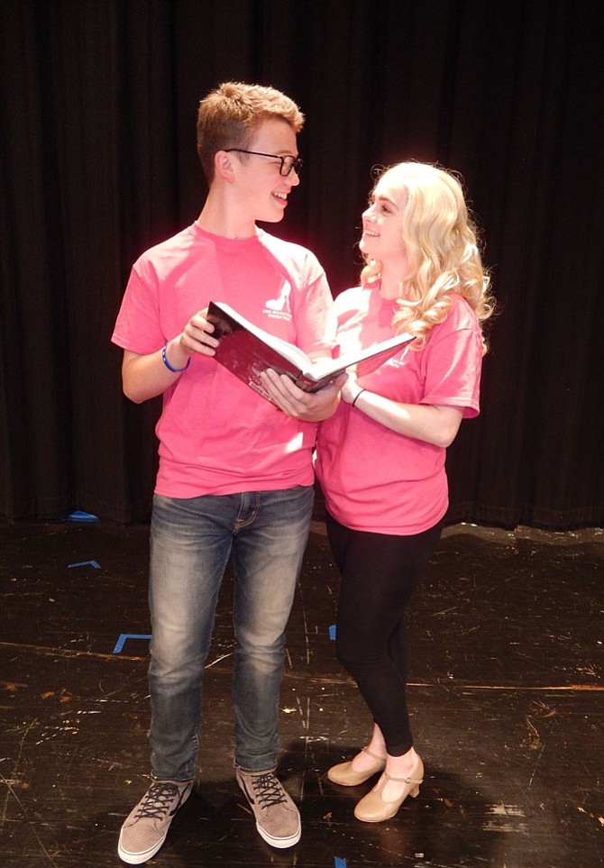 In Westfield’s “Legally Blonde: The Musical,” John Henry Stamper (Emmett) and Molly Van Trees (Elle) share a tender moment while studying. 