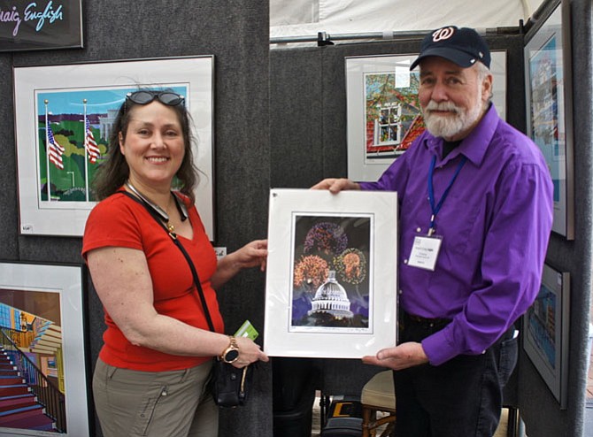Joseph English has been exhibiting at the festival since the event first began. “I love to come to this show to meet old friends and make new ones” like Nancy Tachel of Tysons Corner, a first-time festival attendee who bought an English print for her office.