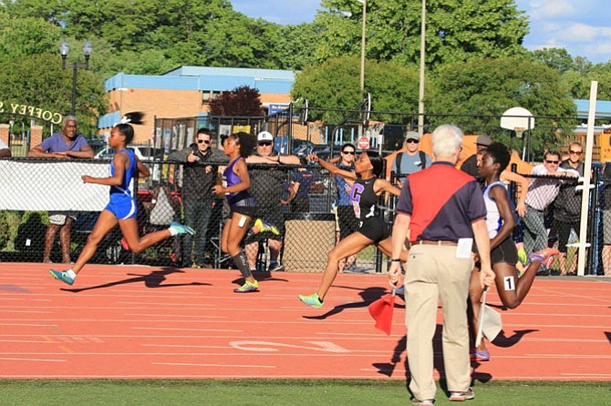 Hannah Waller wins 100 Meters race at the 6A North Region championship.
