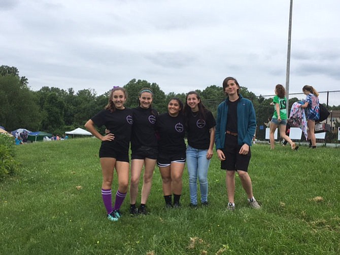 Cooper, Langley, and Mclean students walking the track at Cooper.