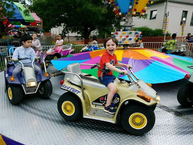 Grayson McHale of Vienna, 3-1/2, enjoyed Saturday at ViVa! Vienna! For many families, day 1 is the best day to go ... no vendors, just rides and food, keeping down the crowds.
