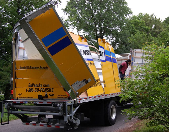 A rental truck shows the result of striking the Alexandria Avenue overpass on the George Washington Memorial Parkway on May 30.
