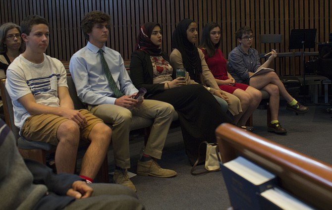 High school students sit in the front row of the Jewish temple and wait to talk to the forum about their experiences with bullying and harassment. From left are Langley High School student Jed Prickett, McLean High School student Jack Reed, J.E.B. Stuart High School students Sara Mohamed and Marafi Badr and McLean High School students Havi Carrillo-Klein and Carmen Beadie.