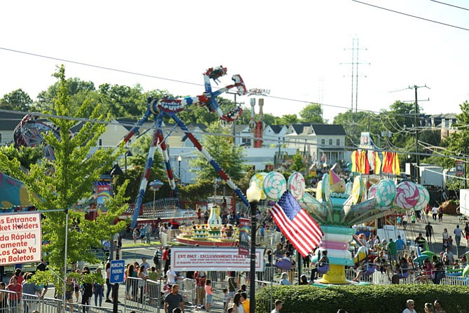 The view from the Old Town Hall building gives a glimpse into the carnival rides in motion.