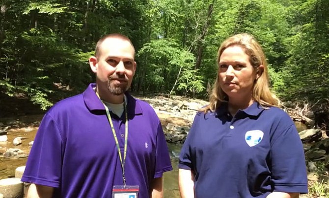 Fairfax County Spokesperson Jeremy Lasich interviews Sara Baldwin, deputy director of the Fairfax County Park Authority, about planned police presence for Scott’s Run Nature Preserve in a video posted to the Fairfax County Government Facebook page. It has received more than 3,000 views.