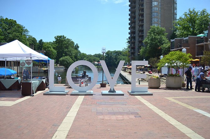 The Virginia is for Lovers ‘Love Sign’ currently rests at Lake Anne, where residents can visit and pose with the famous sign.