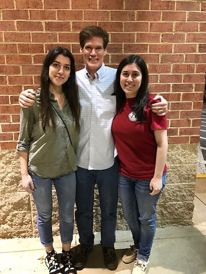 Matt Borkowski of Centreville with his daughters. Lauren Borkowski, 21, on his right, just graduated Marymount University in May. Emily Borkowski, 18, on his left, will graduate from Woodson High School in June and will attend William & Mary College in the Fall.