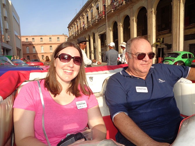 Dr. Mike Maloney of Fairfax with his daughter, Claire, ready to embark on a joyride in Havana.