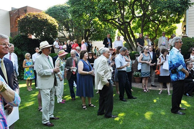 Supporters of the Historic Alexandria Foundation gather for its annual Garden Party on Sunday afternoon, June 11.
