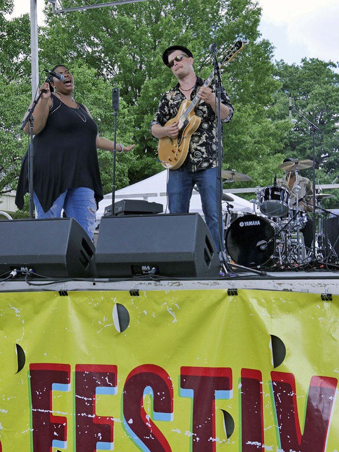 The weather is hot but the music is hotter at the 22nd annual Columbia Pike Blues Festival on June 17.  Sol Roots with Carly Harvey from Charlottesville perform a mix of New Orleans funk, raw blues, energetic rock and southern soul.  
