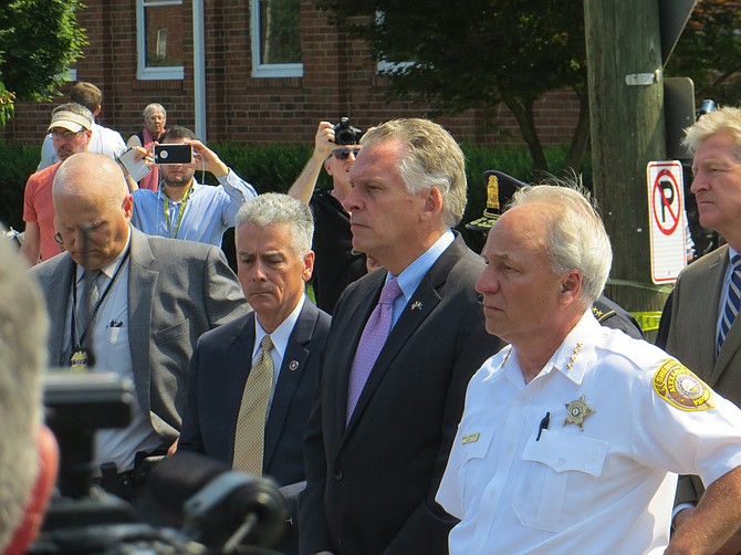 Gov. Terry McAuliffe (center) with Sheriff Dana Lawhorne (right) 
