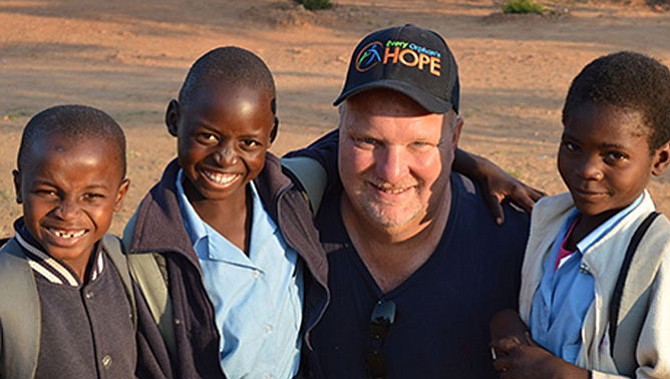 Don Halterman with some of the orphans.
