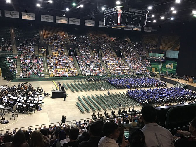 Friends and family join together at Eagle Bank Arena to celebrate the achievements of Thomas A. Edison High School seniors. 