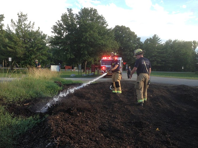 Station 424 Woodlawn responds to a fire in the mulch pile on Sunday, June 25 at Grist Mill Park in Mount Vernon.
