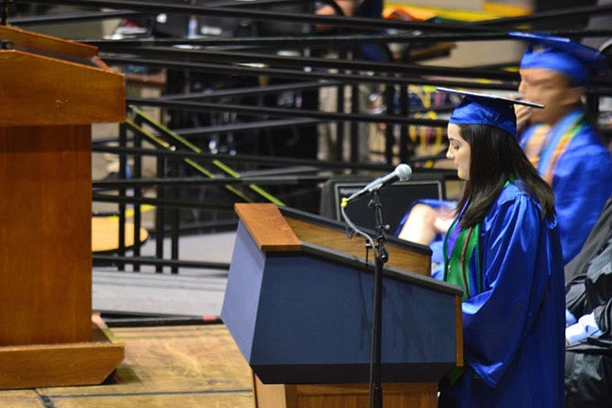 Molly Sheets addresses her fellow students as Class President.
