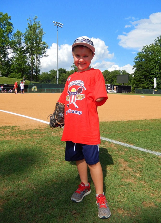 Jack Finney on the field before the Wounded Warrior Amputee Softball Game.