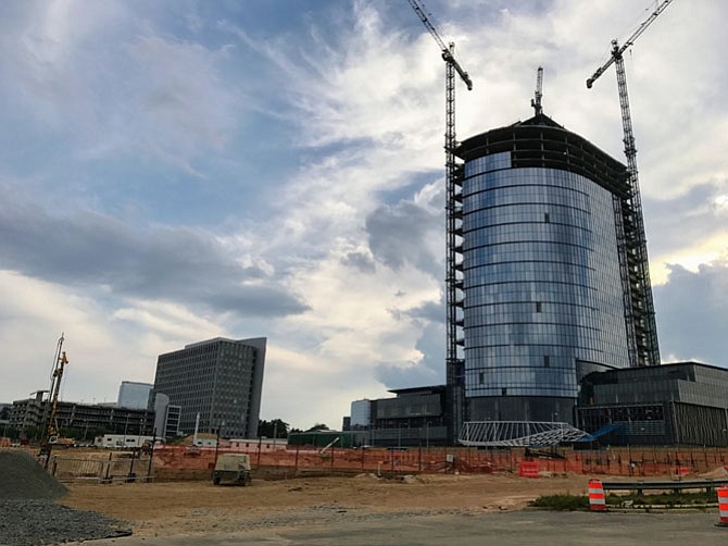 The Planning Commission recommends allowing Capital One to increase development in Tysons from 4.9 million square feet to 5.2 million square feet, while offering a “world class performing arts center” in place of a previously approved community center. The Board of Supervisors will decide on July 11.
