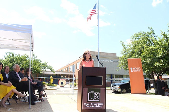 Dorothy McAuliffe speaks about the free summer meals program at Mount Vernon Woods Elementary School on June 28.