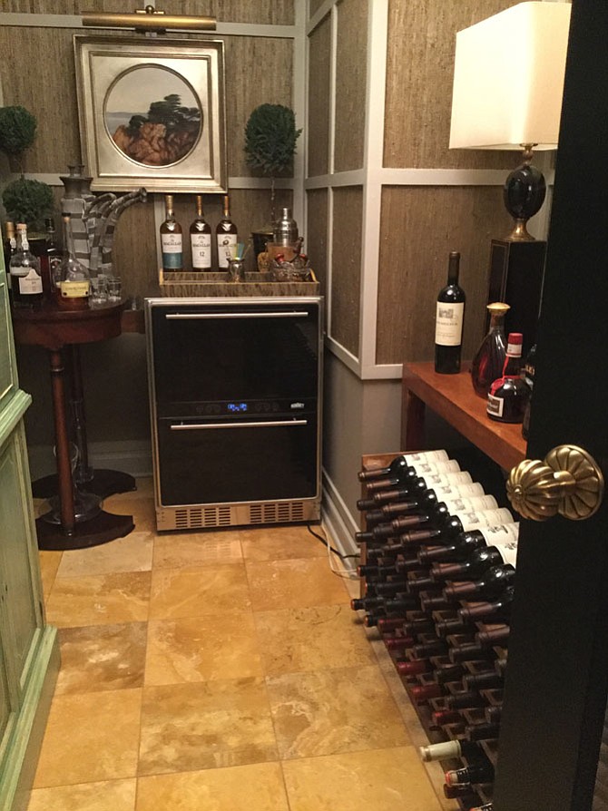 Interior designer Joe Van Goethem transformed a walk-in closet in his McLean home into a wine cellar.
