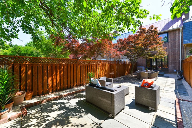 The patio of this Old Town home was designed to be a backyard oasis.