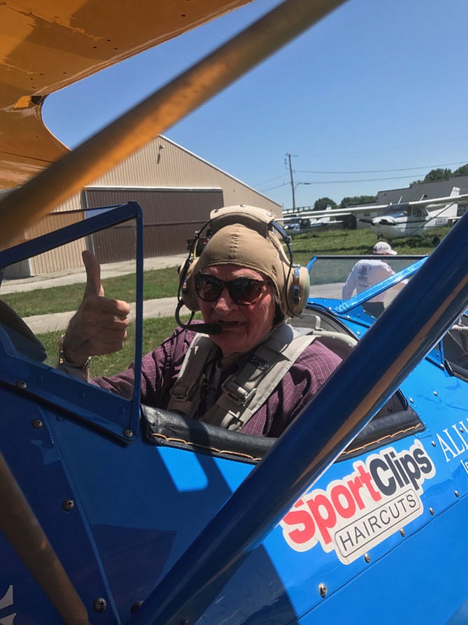Veterans and their families from Spring Hills Mt. Vernon Assisted Living took a Dream Flight in a restored 1940’s Boeing Stearman open cockpit biplane from World War II, on July 9. 
Pictured here, Staff Sergeant Robert Wesemann, 80 years old, U.S. Army from 1961-1966, fought in the Korean and Vietnam Wars, where he received a Purple Heart and Silver Star.