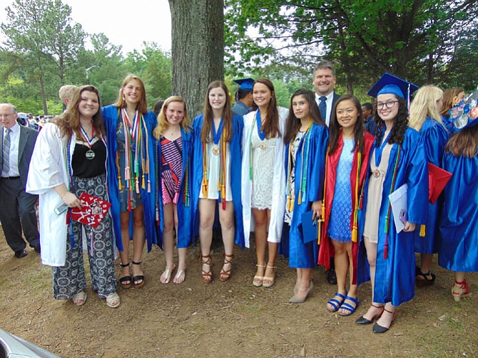 Girl Scout Ambassador Troop 3833, from left, Amanda Dorris, Anna Wolz, Kayla Shelley, Emily Kiernan, Kathleen Lovain, Sierra Arnold, Troop Leader Gordon Shelley, Lucy Brinkman, and Maeve Naughton-Rockwell.
