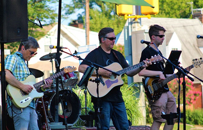 The Buzz Hounds perform at Mount Olivet United Methodist Church, 1500 N. Glebe Road, on Sunday, July 16, during a free outdoor concert on Sunday, July 16. 