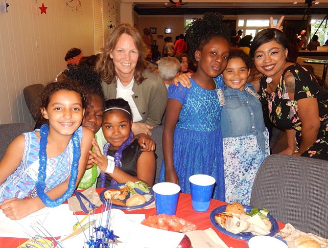 From Barros Circle are (sitting, from left) Jazze Carter, London Towne Elementary; Stephanie Walker, Deer Park Elementary; and Imani Lyles, Centreville Elementary; and (standing, from left) Janet Day, FACETS volunteer at Barros; Breanna Ankomh, Deer Park; Jayden Anderson, London Towne; and Shanel Hudson, FACETS community development advocate.